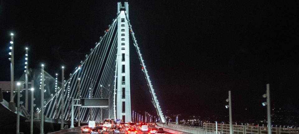 Bay Bridge at night with car rear lights